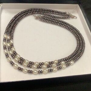 Black and white multi strand freshwater pearl necklace, sterling silver clasp